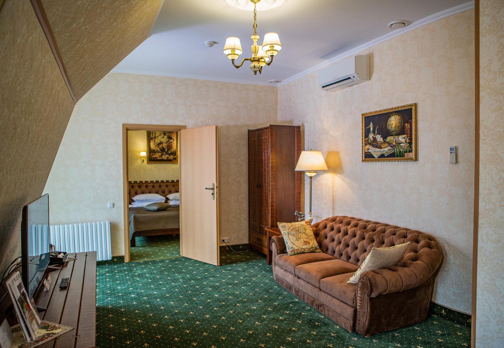 Premier Hotel Palazzo Полтава Стая снимка